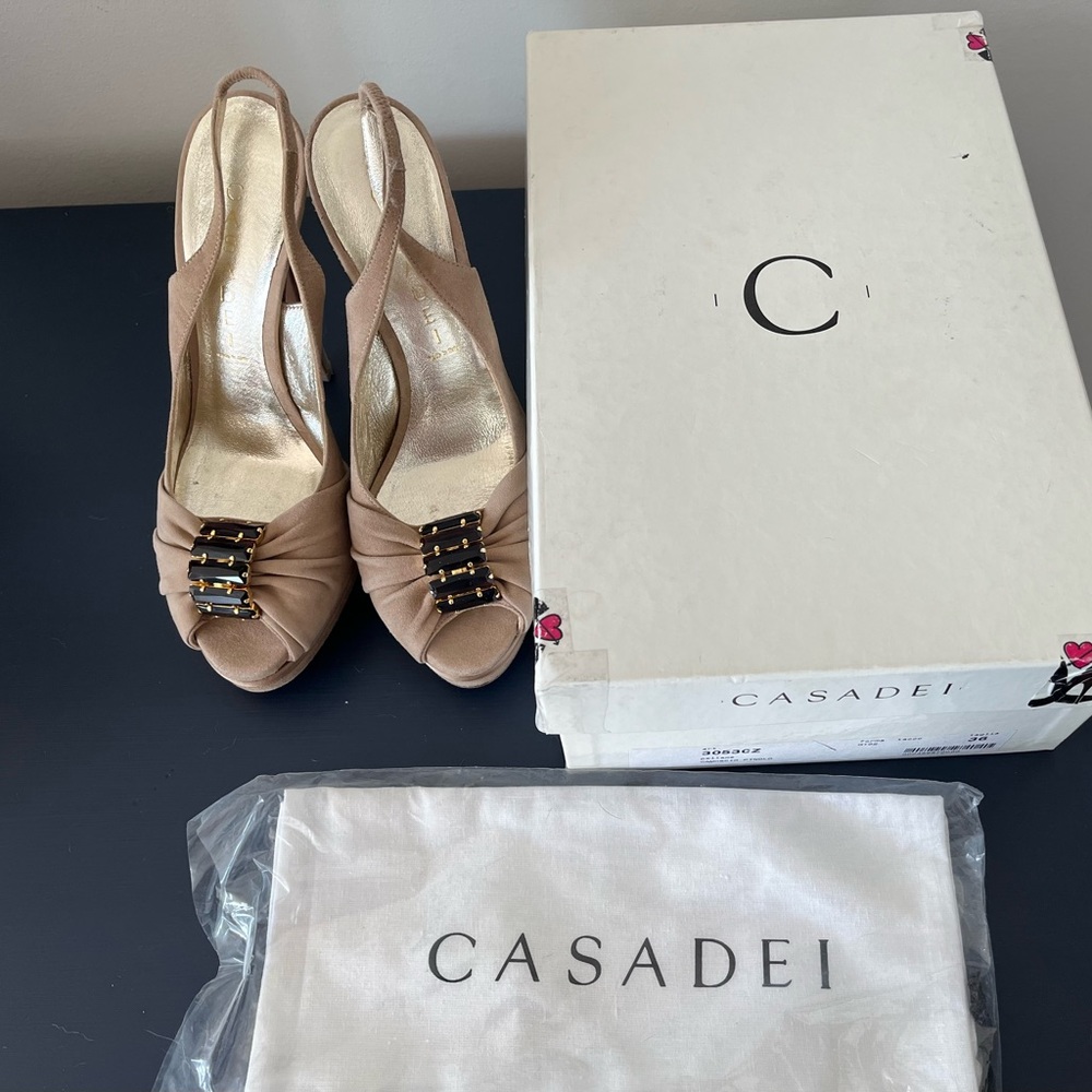 NWT Casadei 4” heels with cloth shoe protectors.